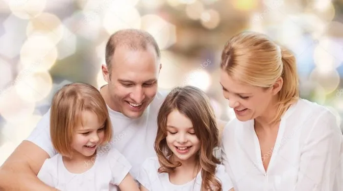 depositphotos_59045109-stock-photo-happy-family-with-book-at-800x445